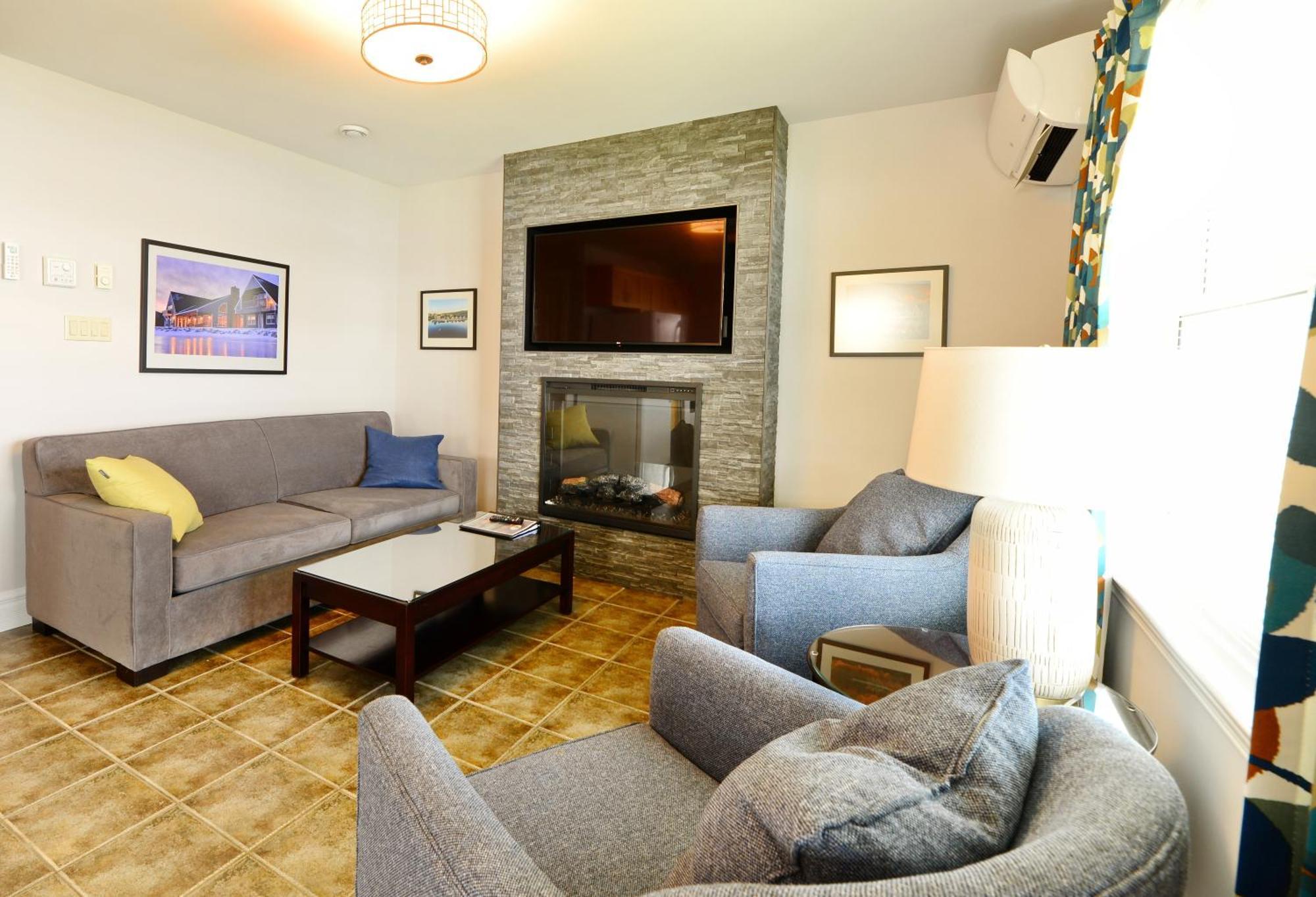 Keltic Quay Cottages & Bayfront Lodge Whycocomagh Экстерьер фото