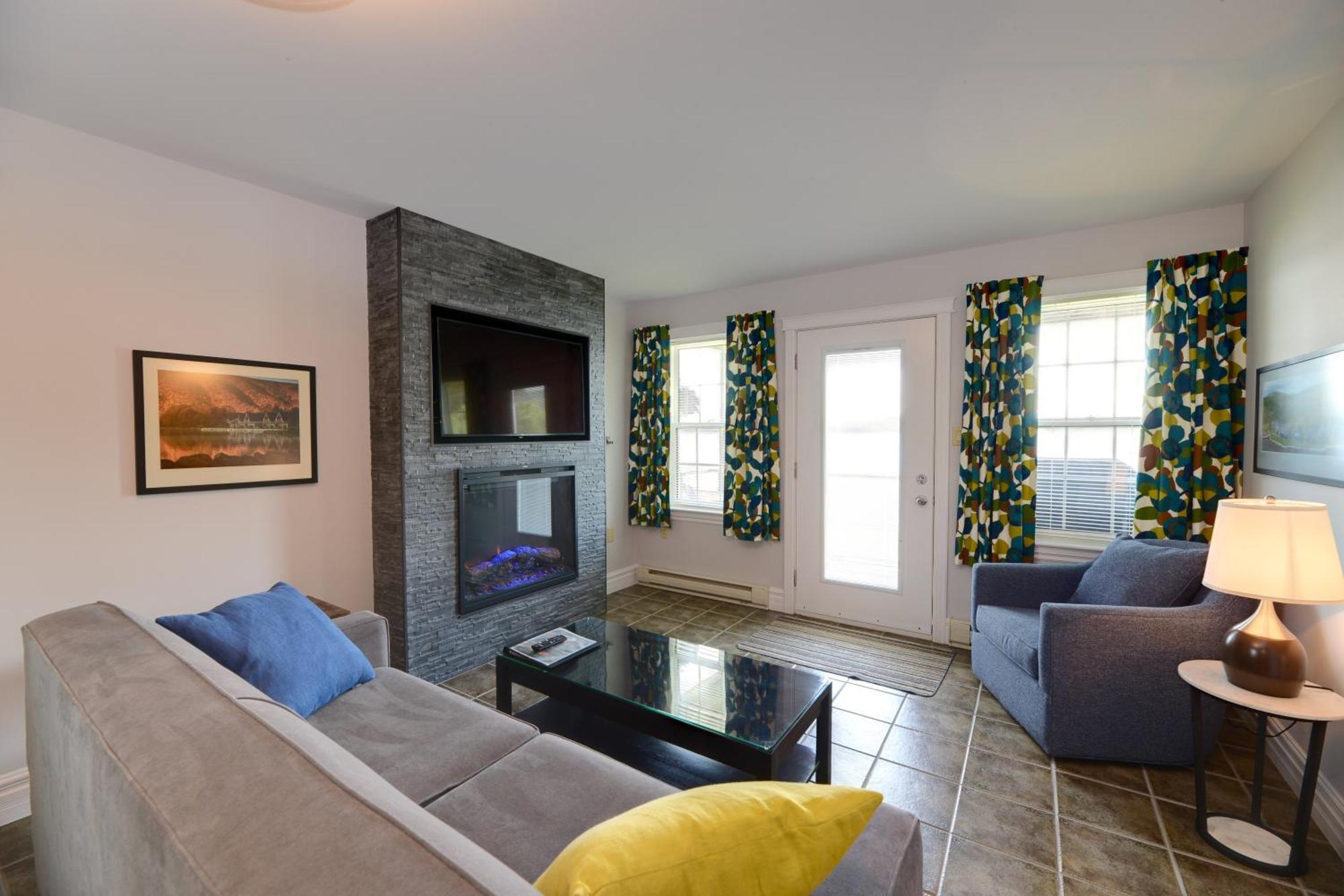 Keltic Quay Cottages & Bayfront Lodge Whycocomagh Экстерьер фото